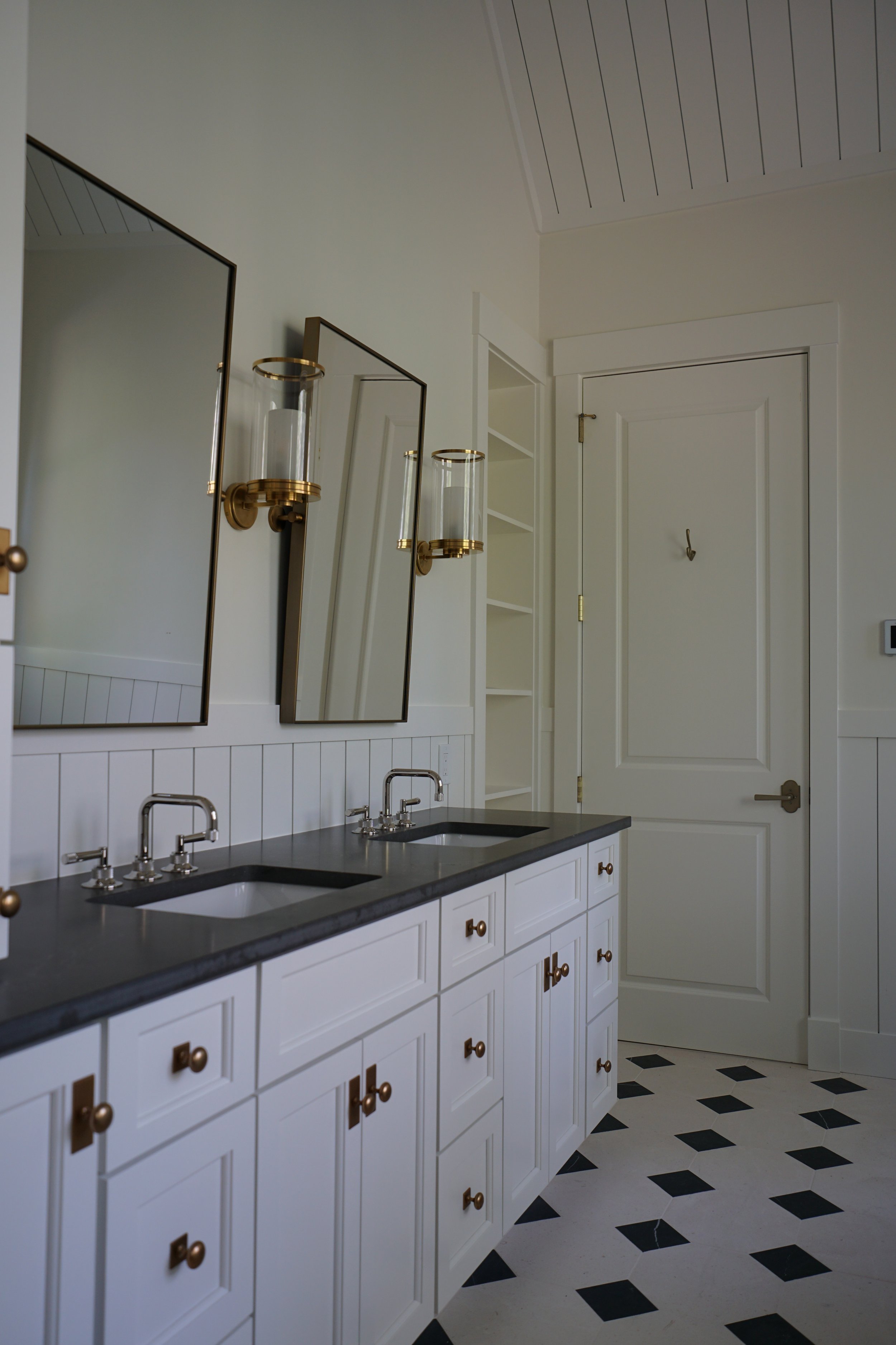 Luxury Rhode Island coastal home by Spinazzola Interiors featuring European farmhouse architecture, custom millwork and timeless coastal interiors.