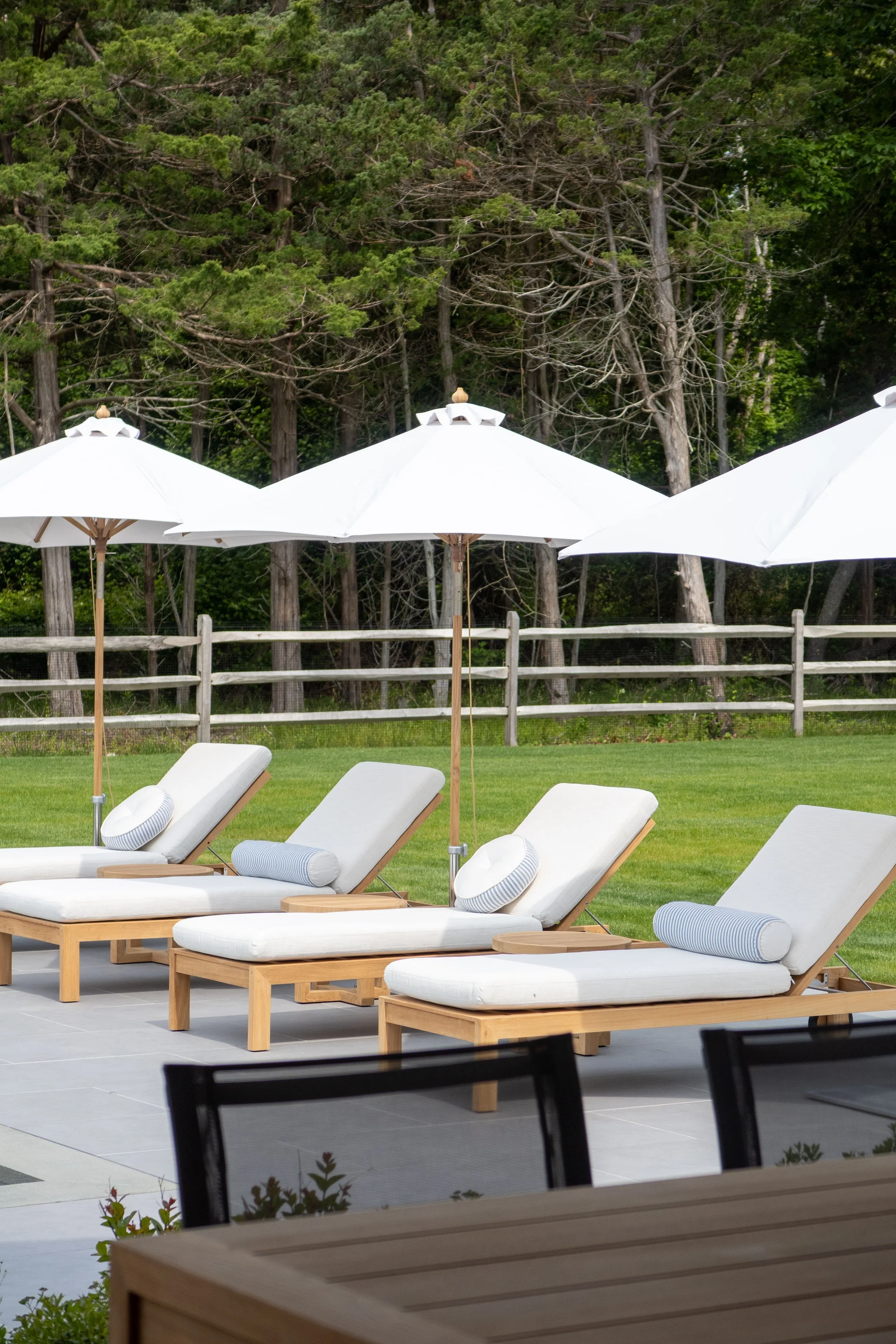 Hamptons coastal home designed by Spinazzola Interiors featuring reclaimed wood beams, handcrafted finishes and timeless luxury interiors.