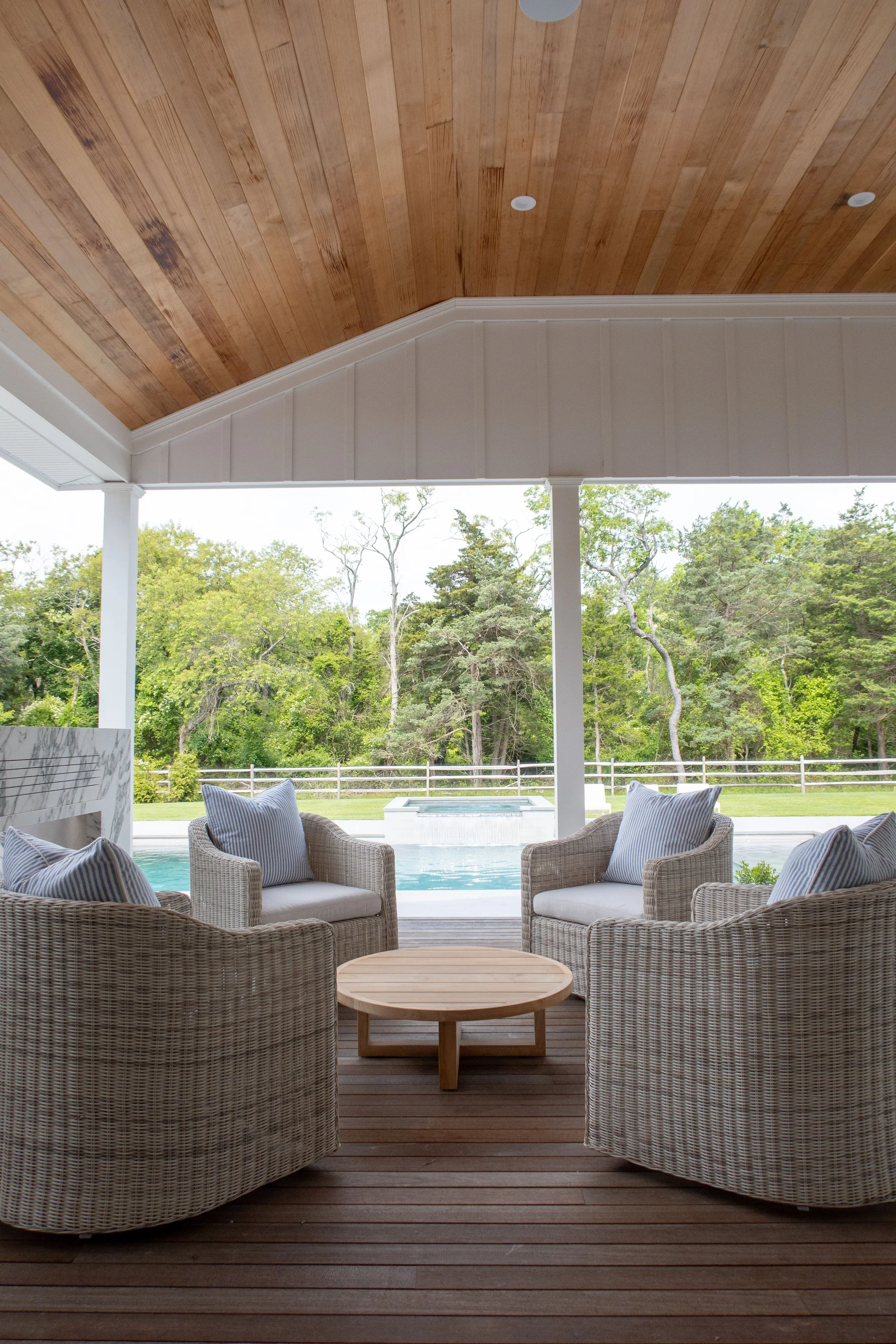 Hamptons coastal home designed by Spinazzola Interiors featuring reclaimed wood beams, handcrafted finishes and timeless luxury interiors.