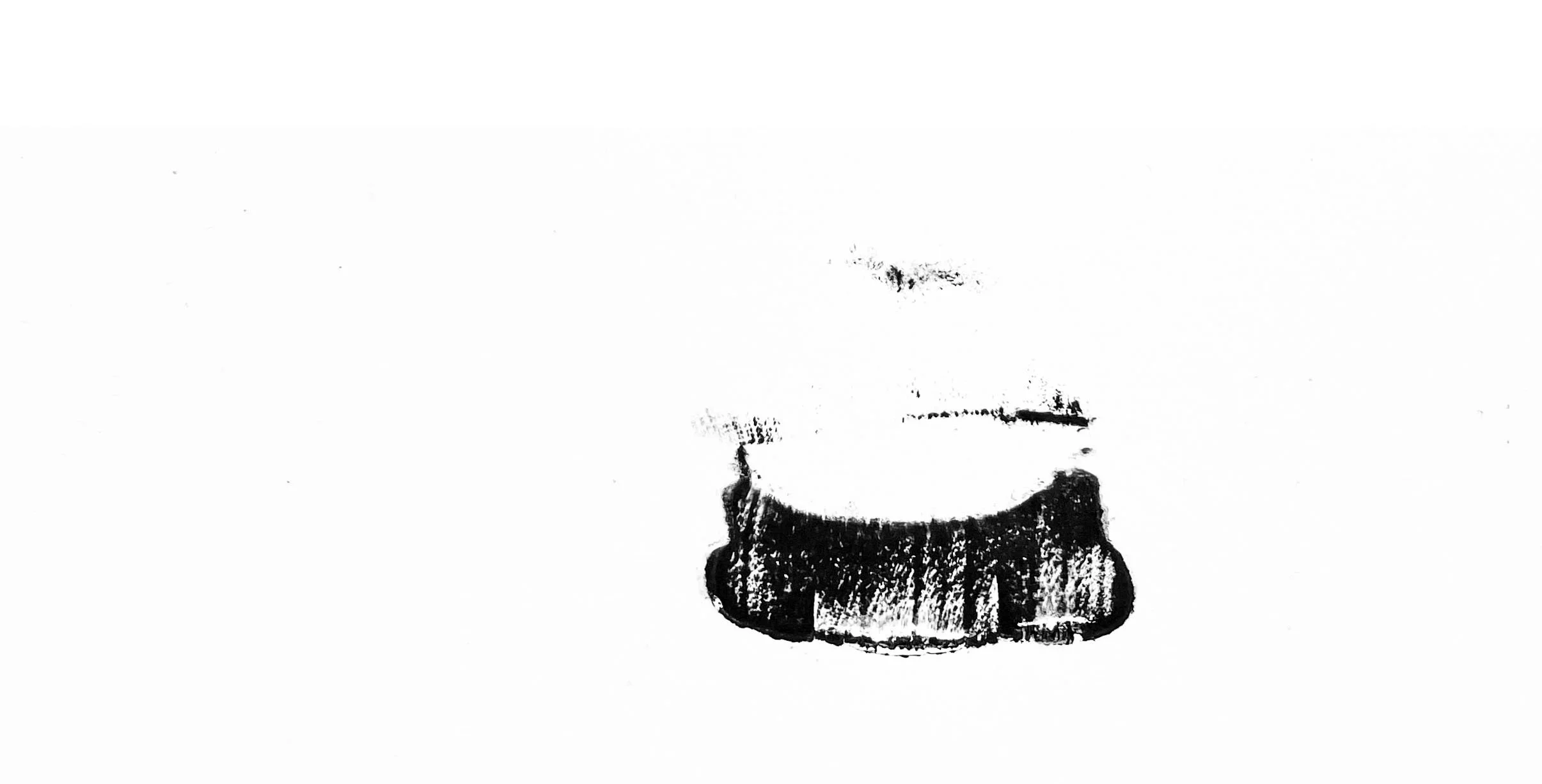 Trainer (stills), 2023. Relief prints from sliced trainer (sneaker).