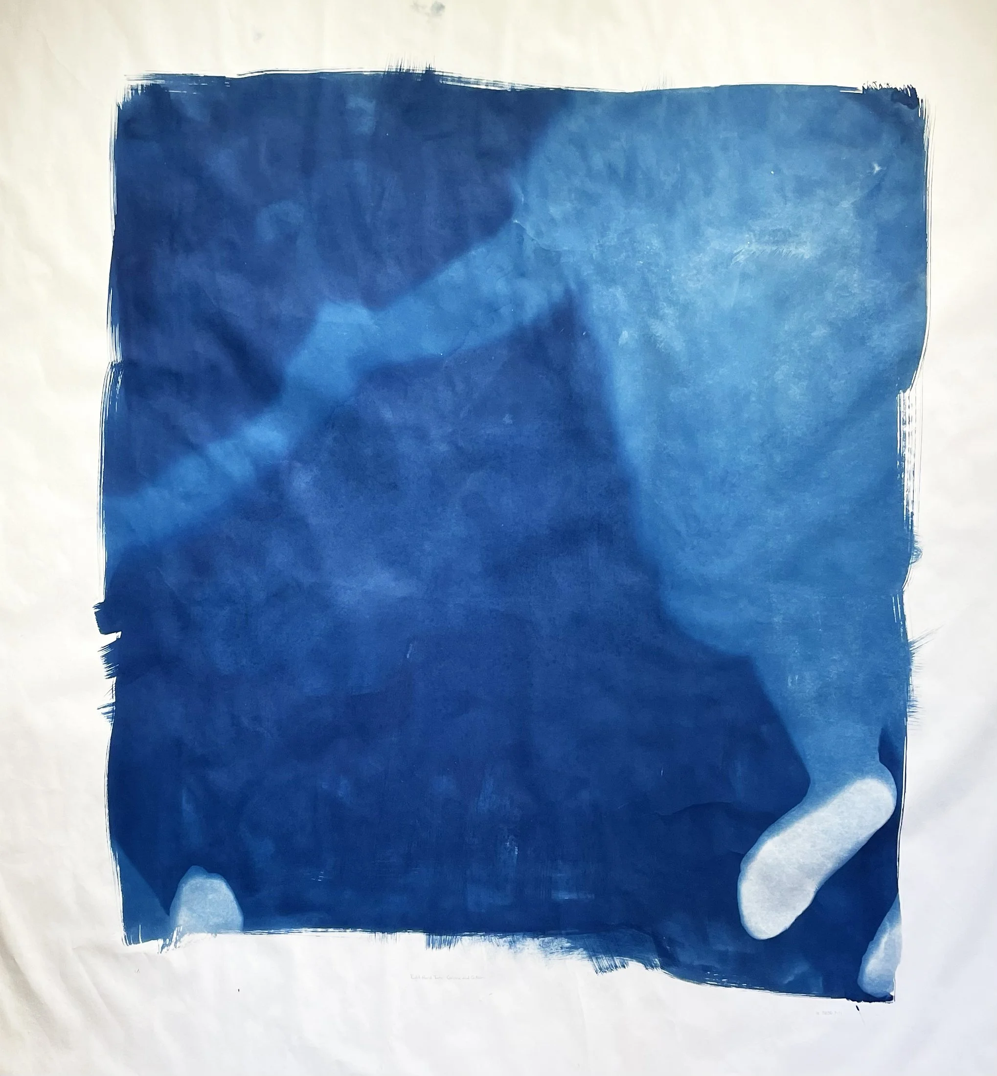 Right-Hand Turn: Gillian and Corinne, 2026. Cyanotype on paper, 52 x 48 inches (approx.). 

While making this print, Gillian and Corinne paused their movement long enough to capture a clear shadow of their connected hands and the partial imprint of t