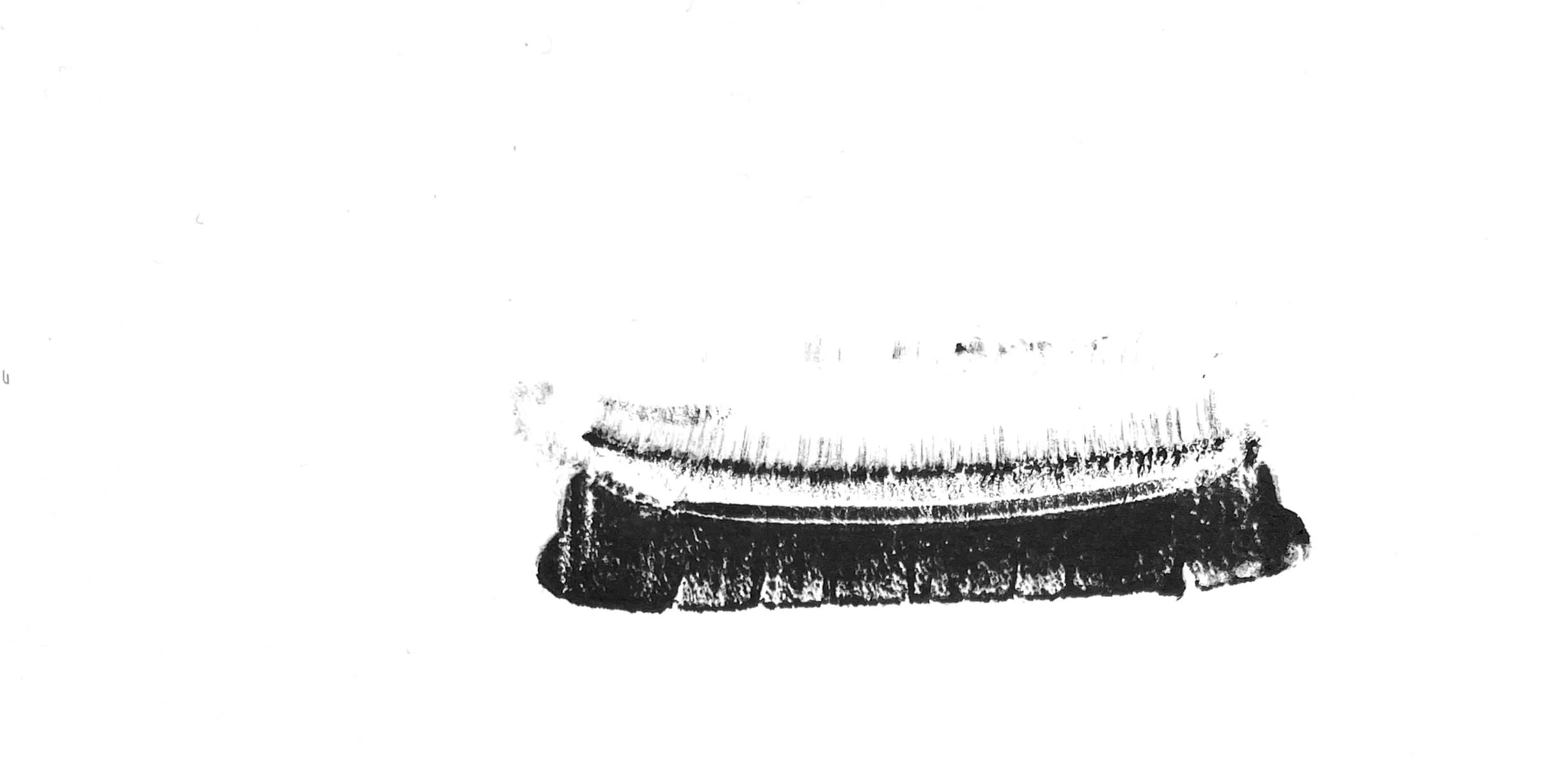 Trainer (stills), 2023. Relief prints from sliced trainer (sneaker).