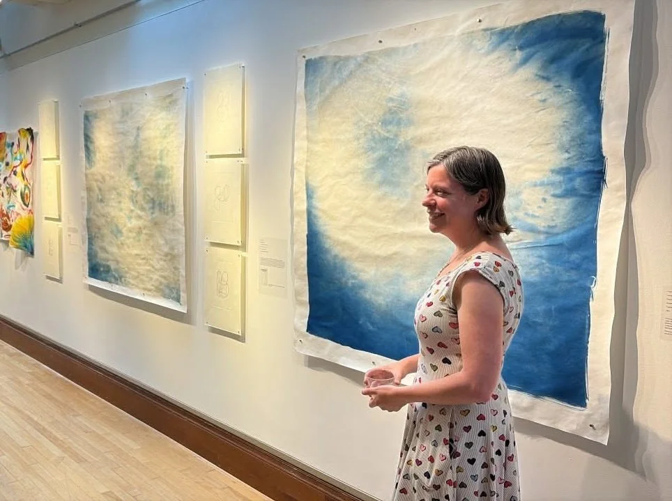 Installation view with artist at Emmanuel College, Boston, 2026. Photograph by Aloysius Yanas.
