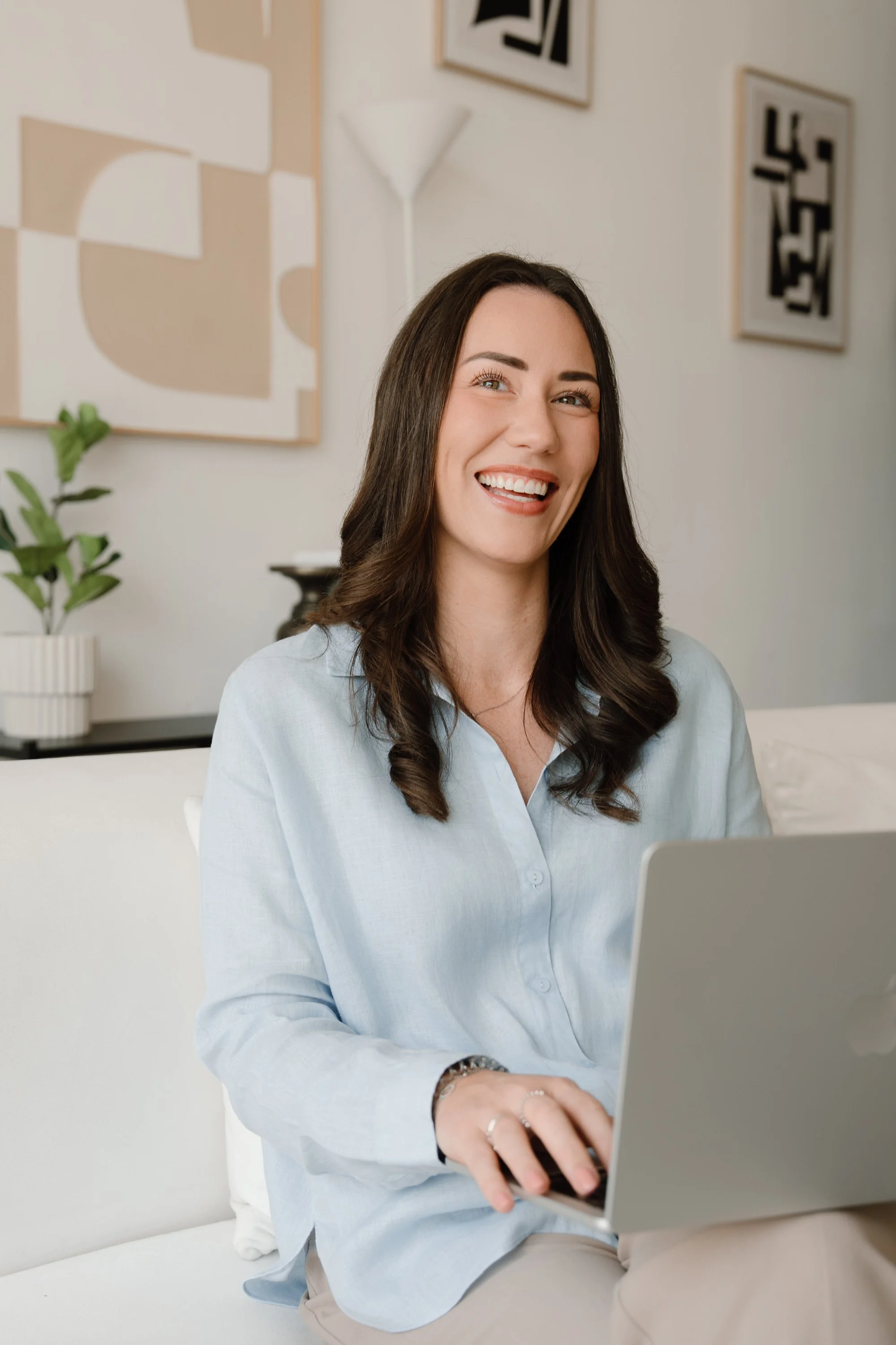 Rachel Bendle, Founder of The Early Years Advisory, working from a laptop.