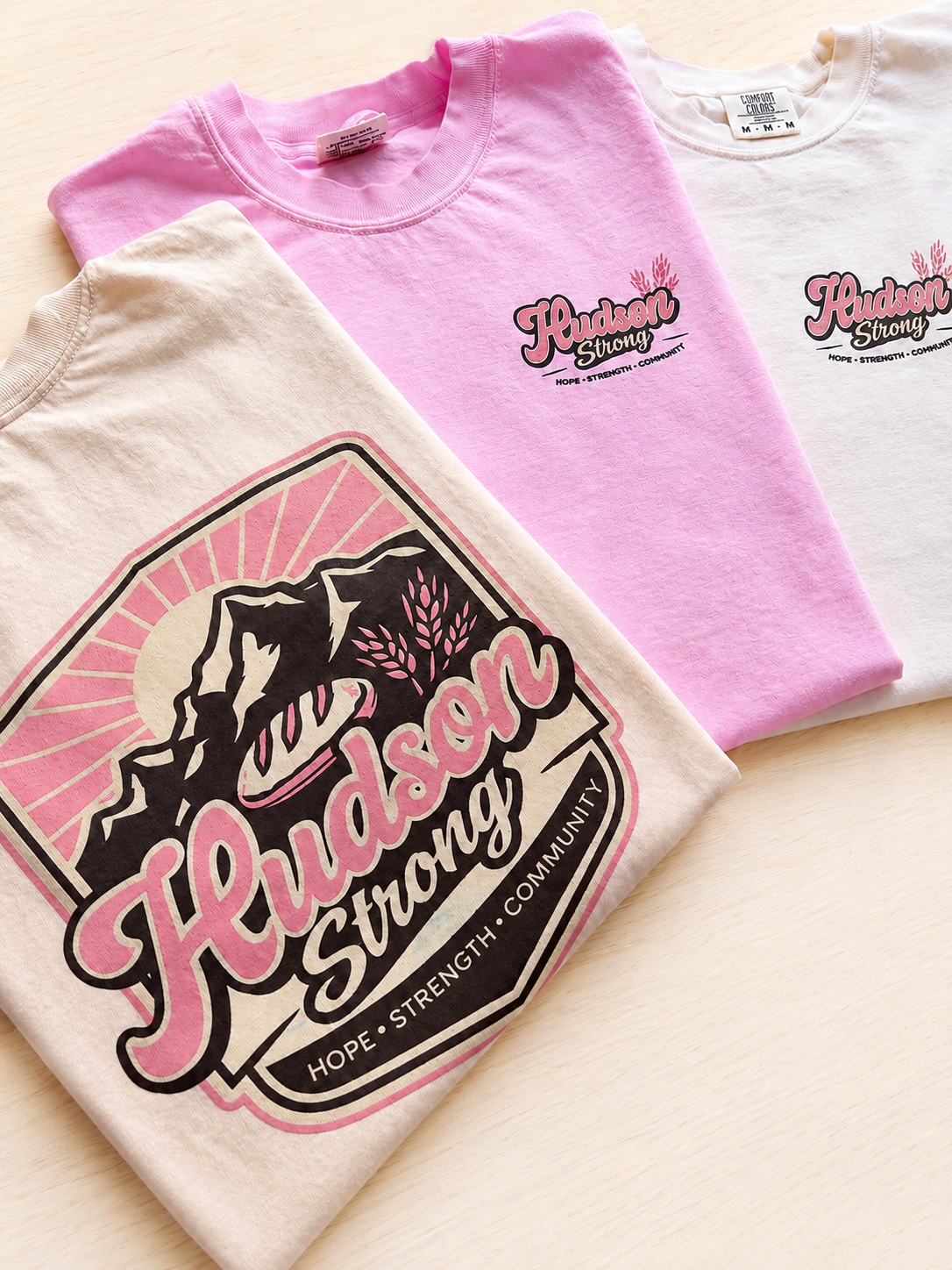 Three folded T-shirts with 