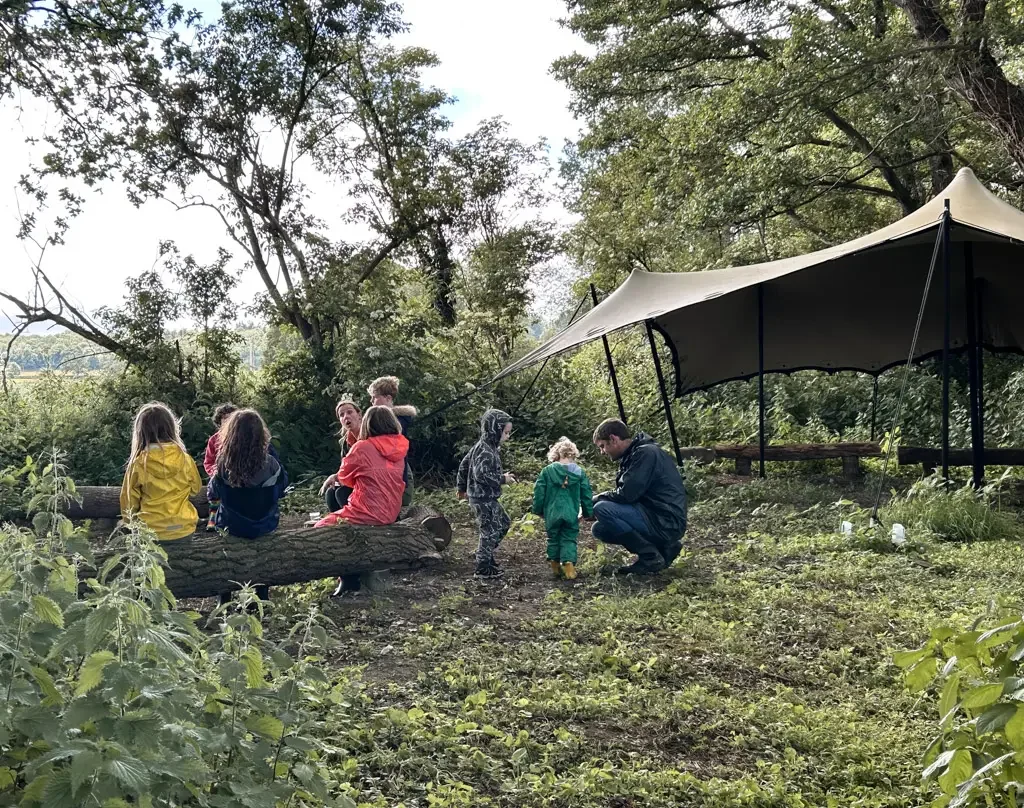 Children's woodland tent and outdoor learning area at Eyton Burrow nature school Shropshire
