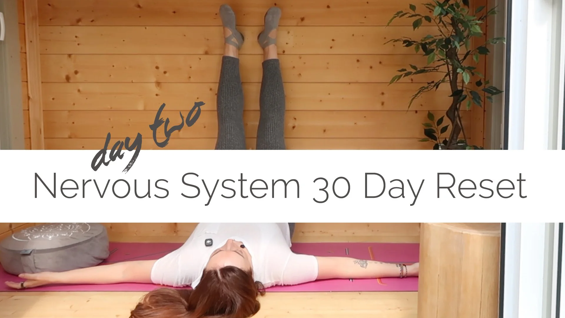 Woman lying on a yoga mat with arms outstretched, practicing yoga near a wooden wall and green plant, for a "Nervous System 30 Day Reset" program.