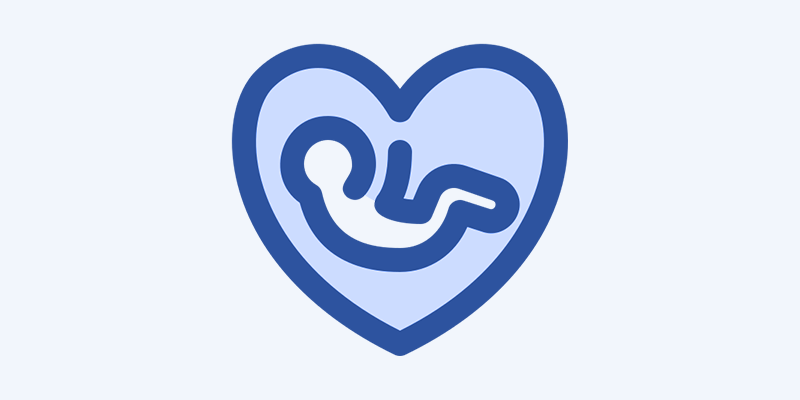 Icon of a fetus inside a heart outline.