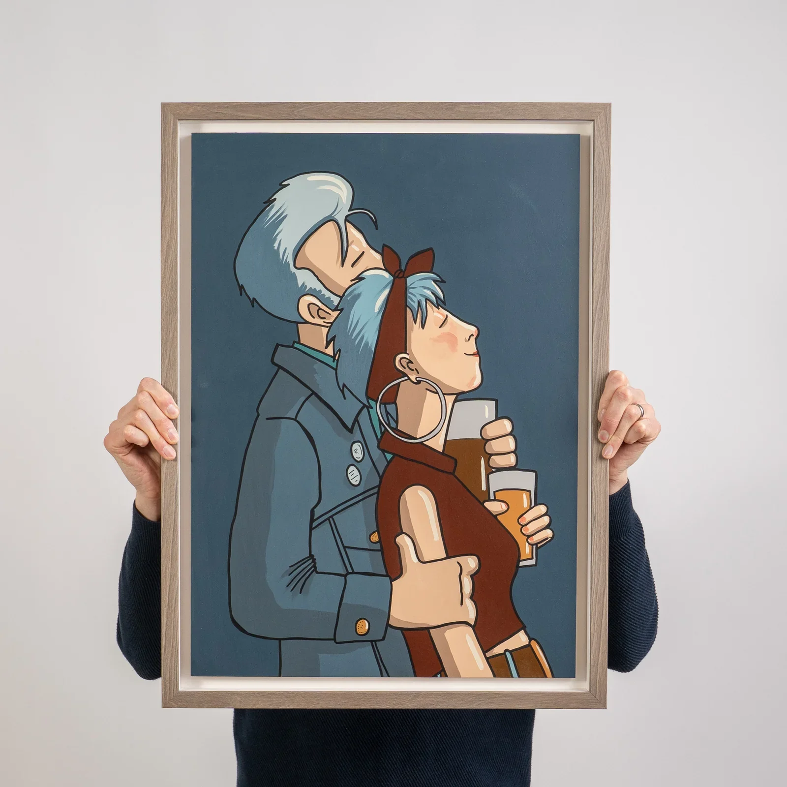 image of a person holding up Pete McKee painting 'how we used to watch great moments in popular music'