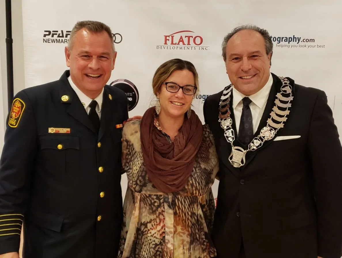  Mayor Steve Pellegrini on the right is wearing a chain of office.