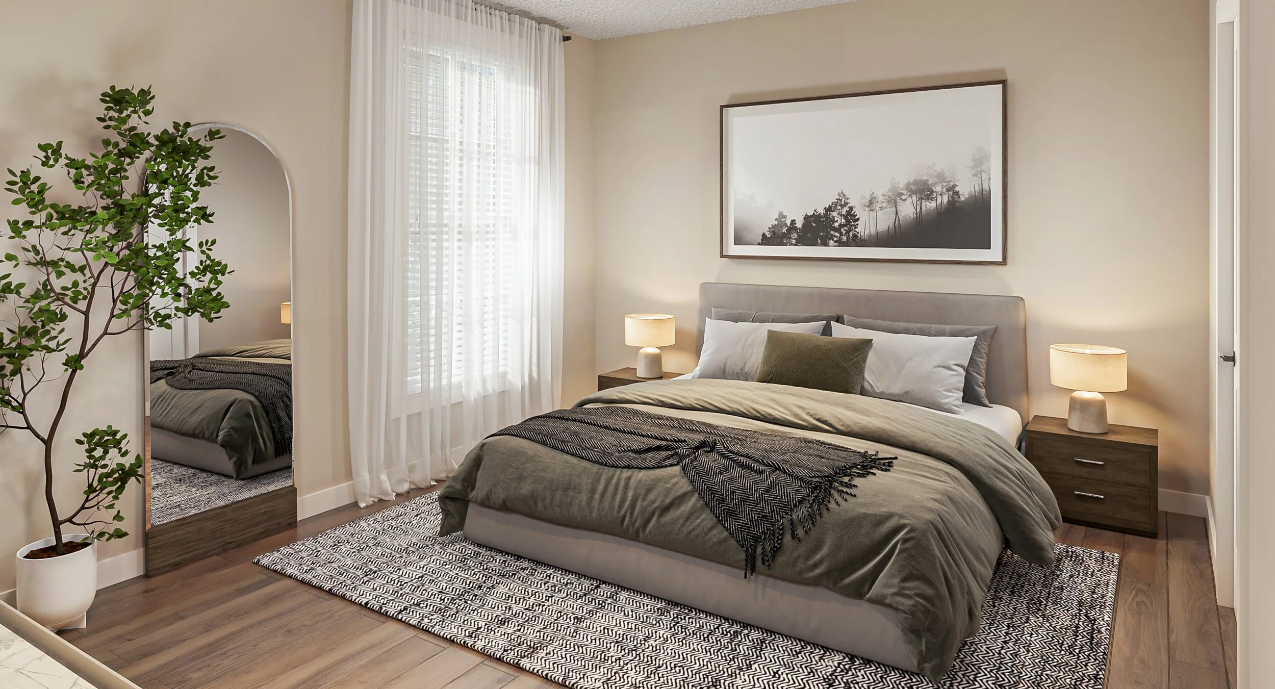 A modern bedroom with a bed, bedside tables with lamps, a large framed black-and-white forest photo, a large mirror reflecting the bed, a potted plant, and white curtains over a window.