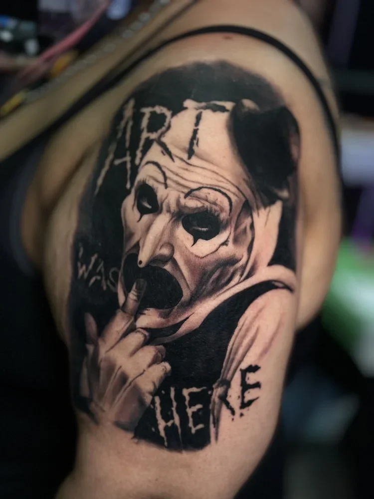 tattoo in upper arm
