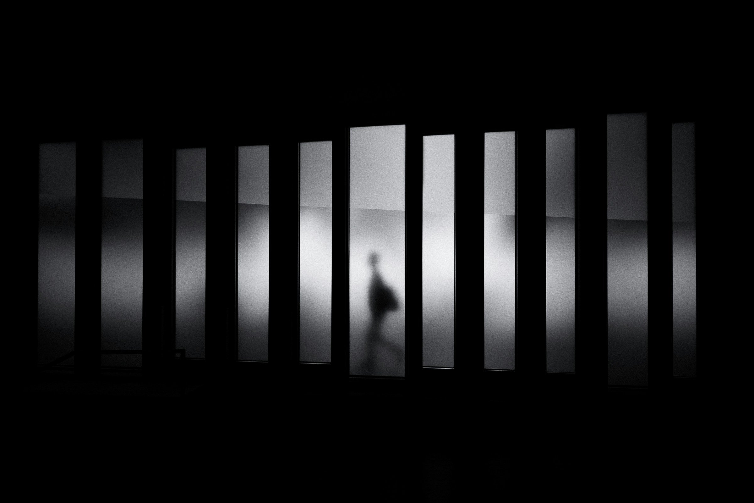 Shadow of individual walking.
