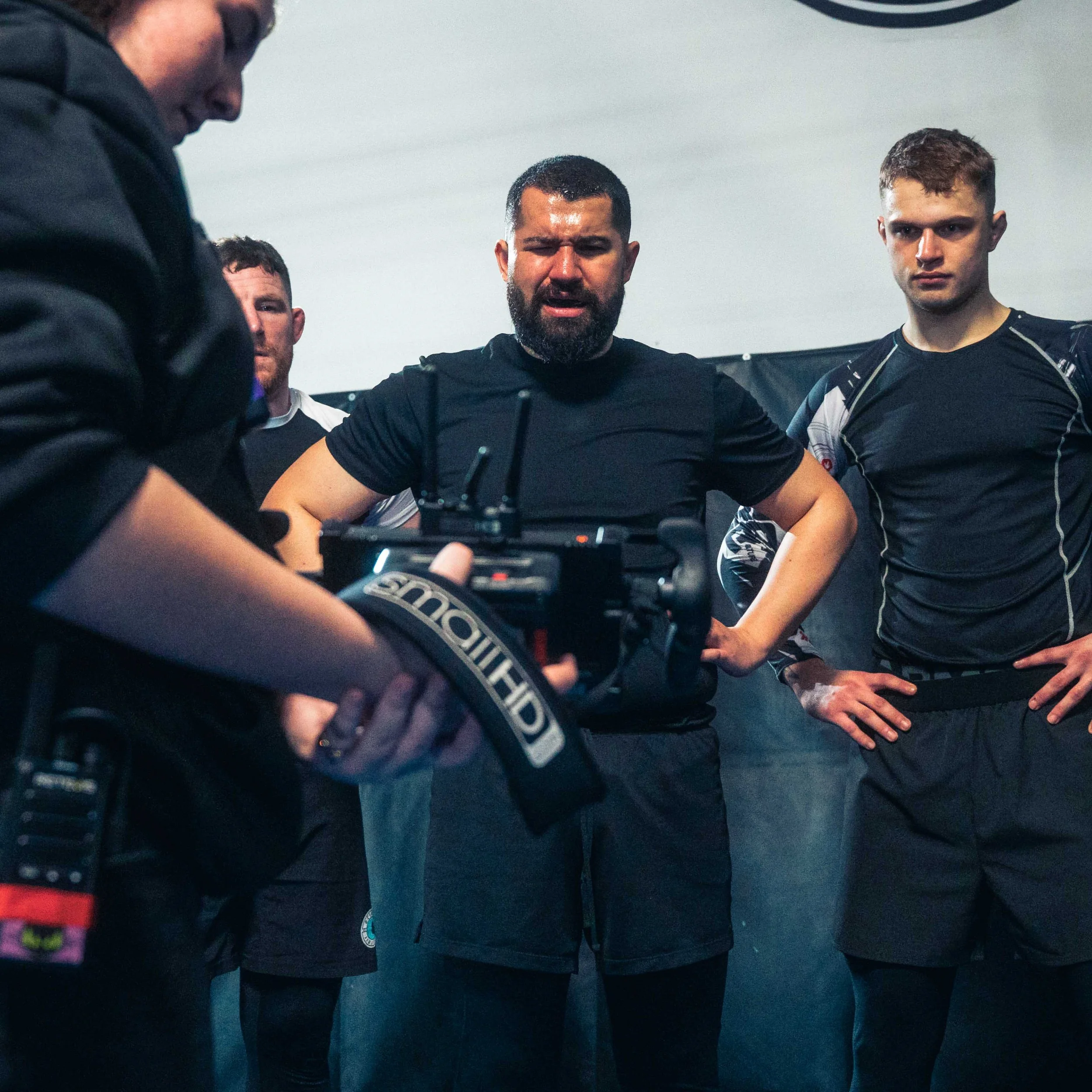 Jordan Murshed directing performers during a rehearsal and camera setup for the short film The Comeback.