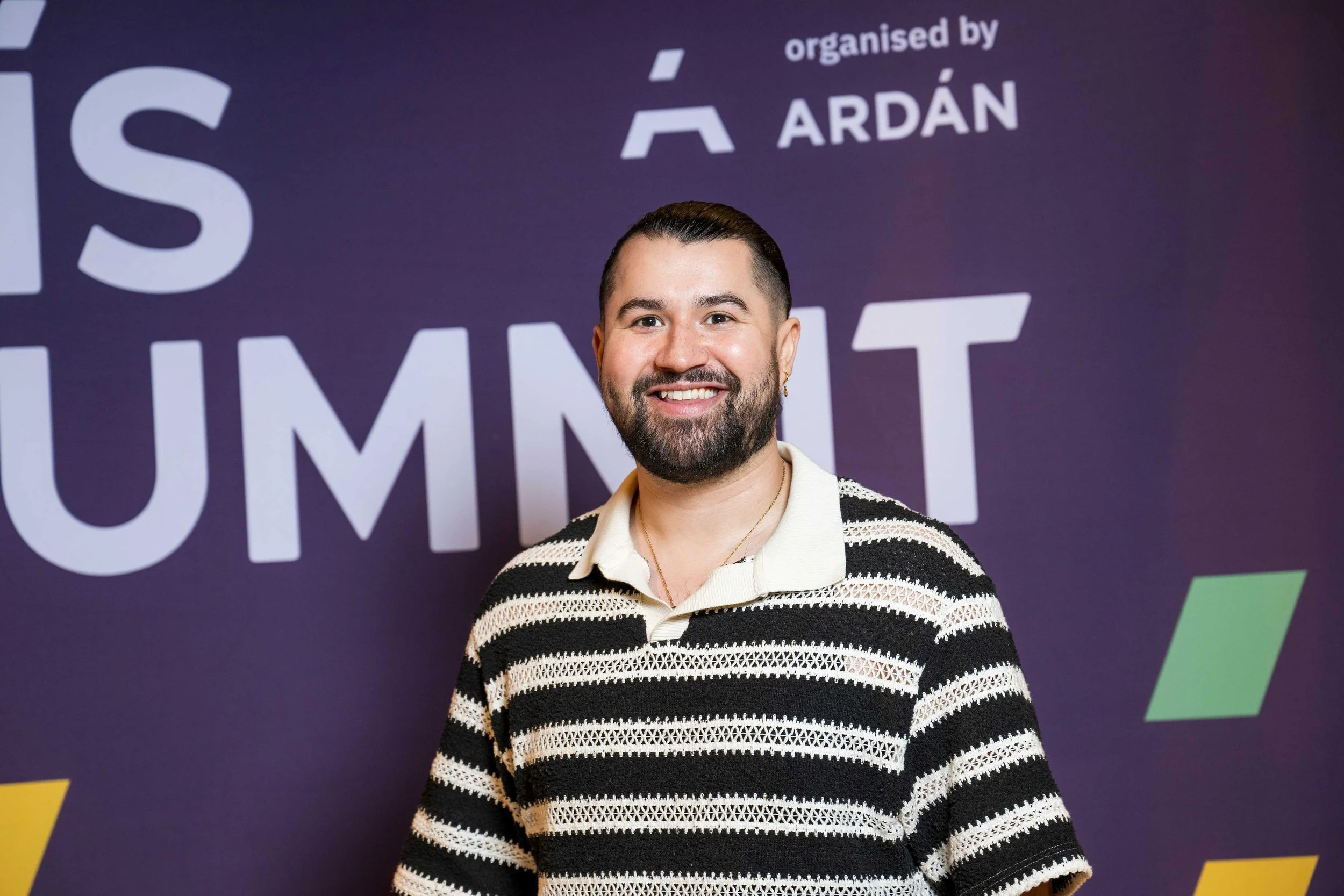 Professional portrait of Jordan Murshed at the FÍS TV Summit 2025, where he participated as a finalist showcasing original television development work to members of the Irish screen industry.