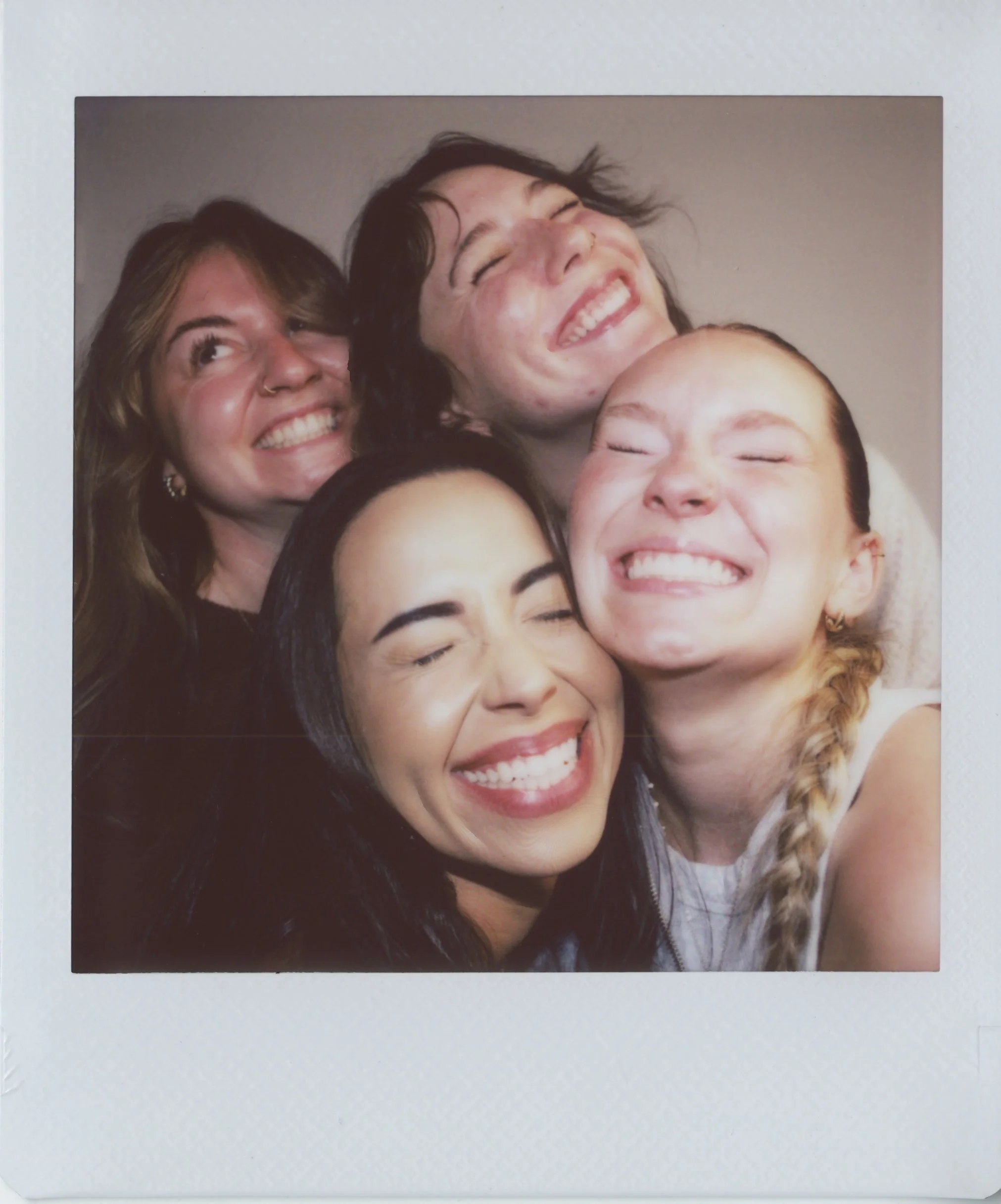 Group of friends smiling and laughing together