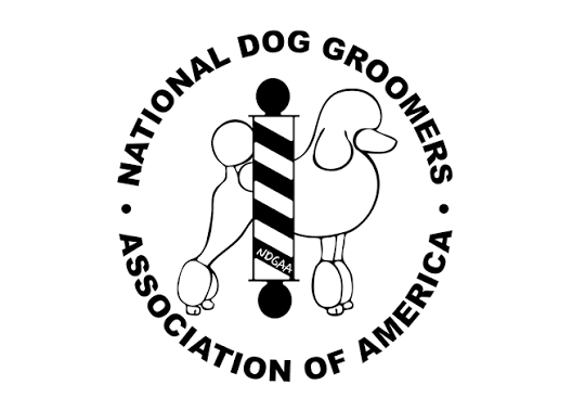 Logo of the National Dog Groomers Association of America, featuring a dog and a groomer with grooming tools.
