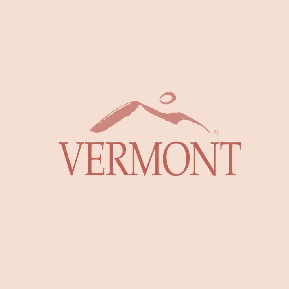 Vermont logo with a drawing of a mountain and a small circle representing the sun or moon.