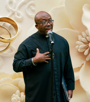 Minister Adrian Johnson officiating a wedding ceremony in South Florida.