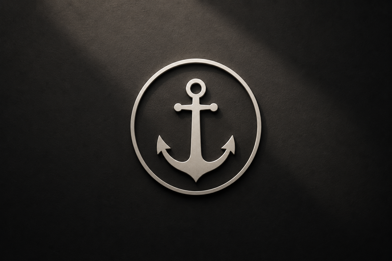 Silver anchor emblem enclosed in an oval on a dark textured background.