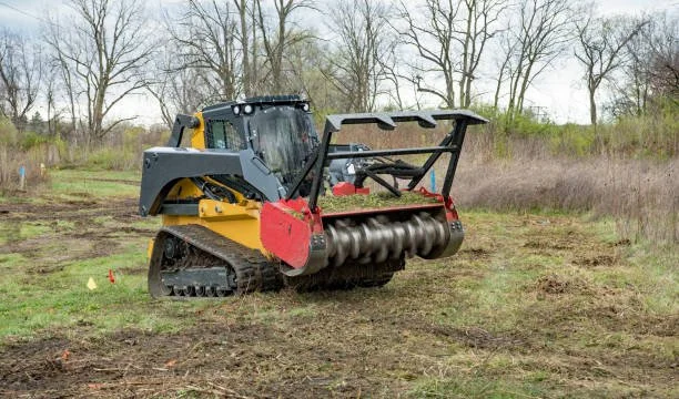 Skid Steer or track load with forestry mulching head, land clearing, forestry mulching, wildfire mitigation, brush clearing