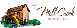 Logo for Mill Creek Natural Foods featuring a watermill, green bushes, and sky with clouds.