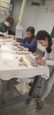 High School Kids making clay sculptures.jpg