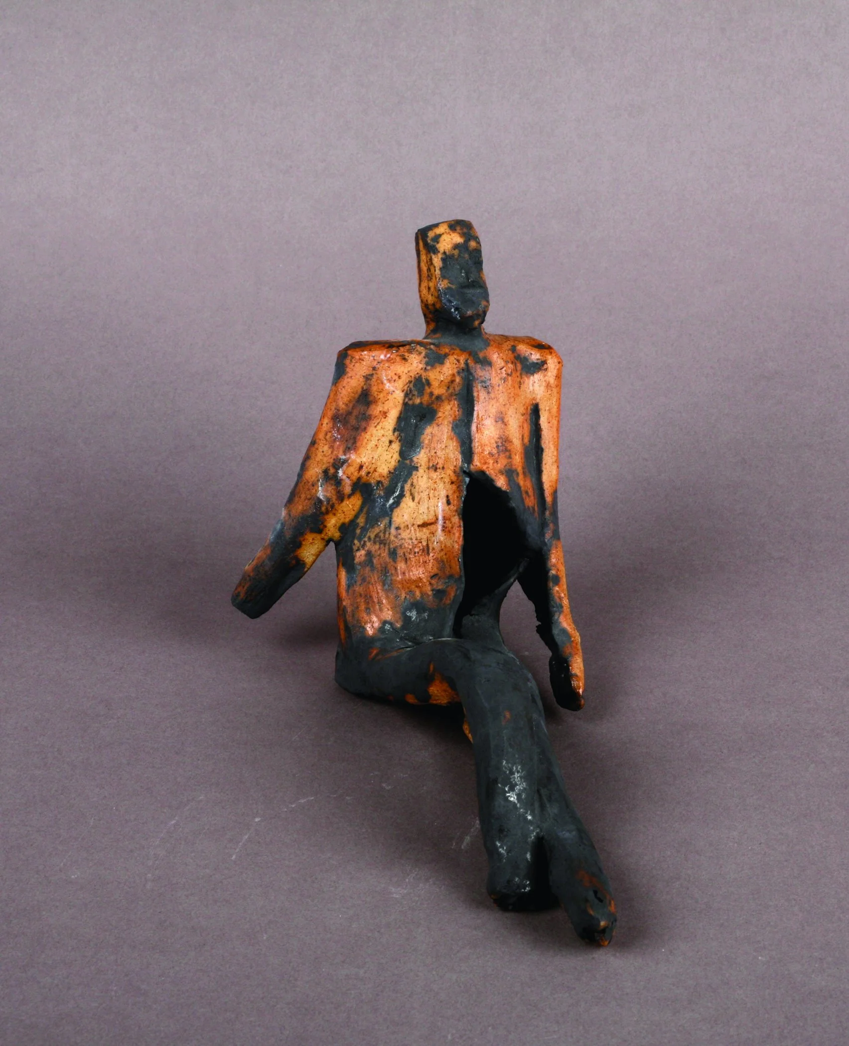 Man sitting, ceramic sculpture.jpg