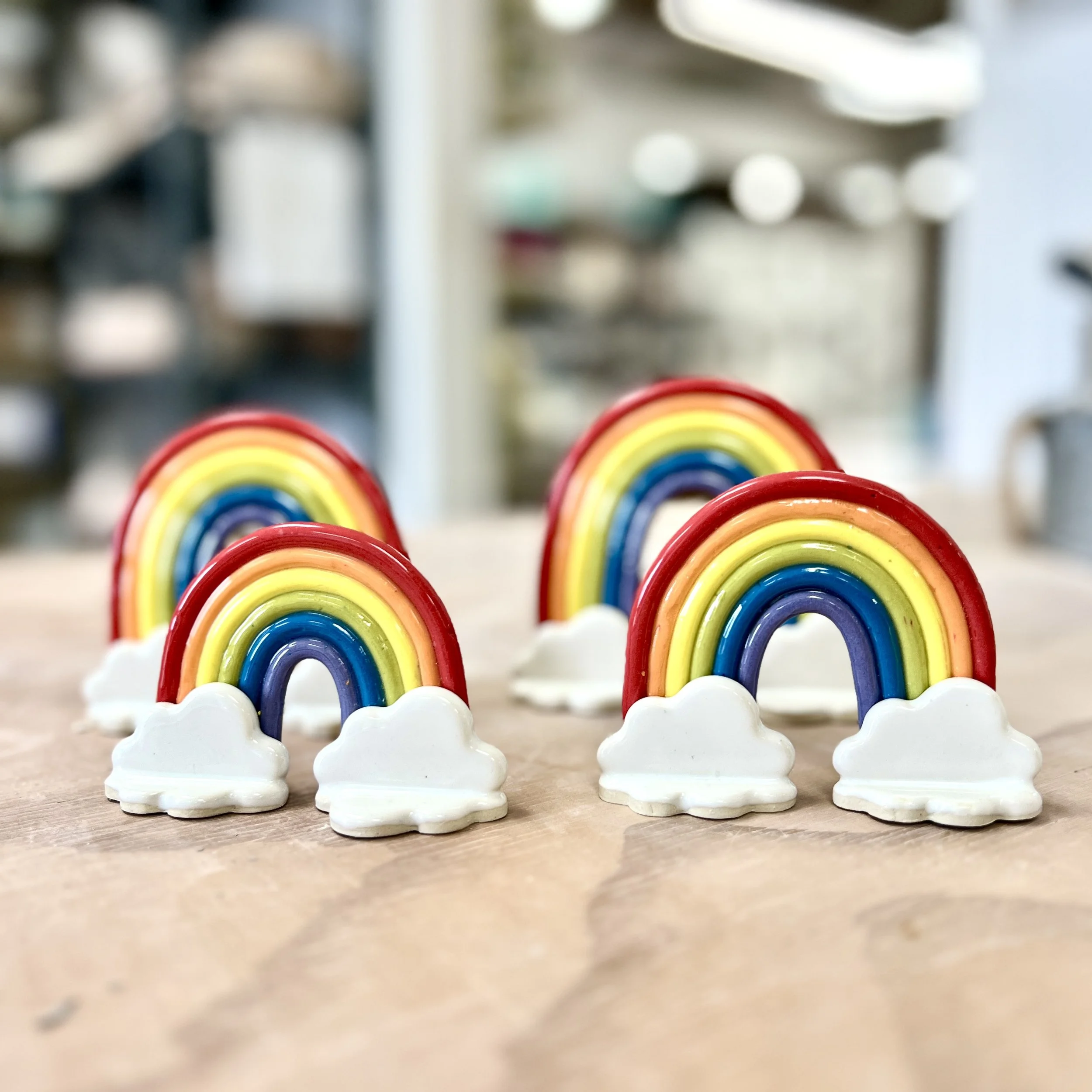  ceramic porcelain rainbows, sitting on cloud stands