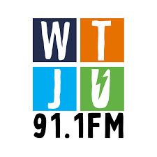 Logo of WTJU 91.1 FM features four colorful squares with white letters "W," "T," "J," and a stylized "U," representing a vibrant radio station.