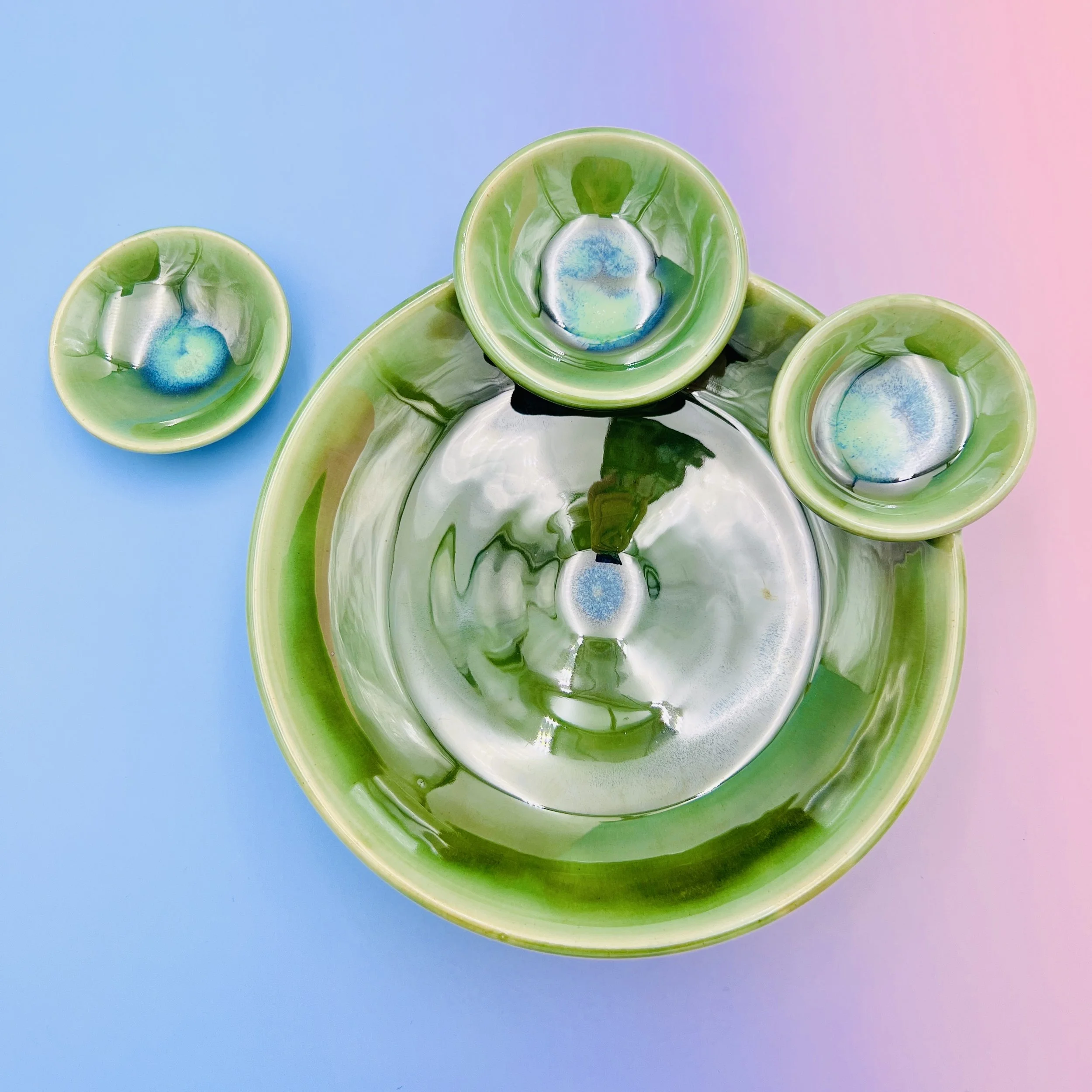  ceramic plate with two dipping bowl, attached to the top and one dipping bowl outside