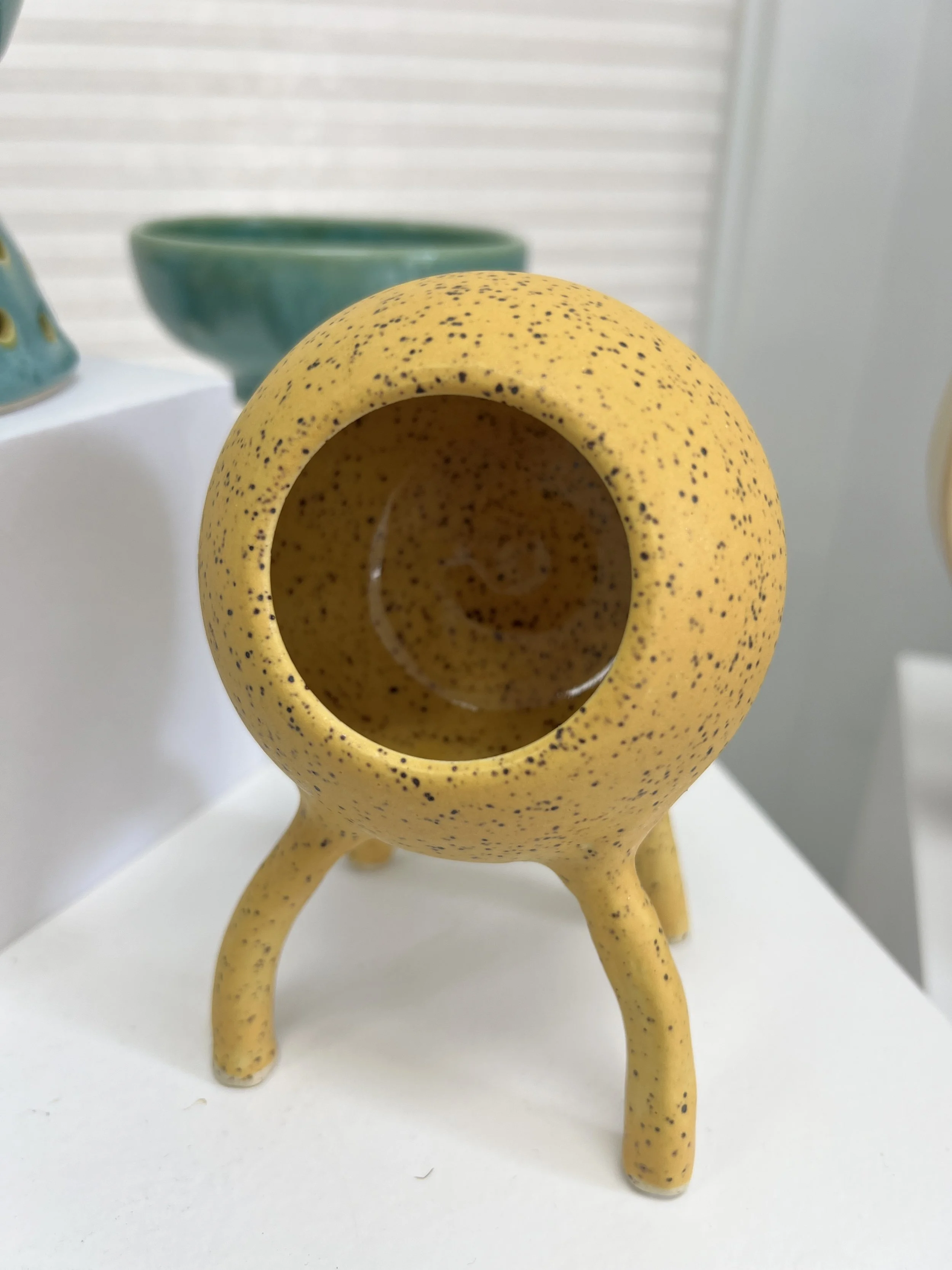 ceramic vessel on four legs