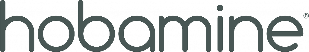 Close-up of the Nobamine logo printed on a black fabric surface, likely a piece of clothing or merchandise.