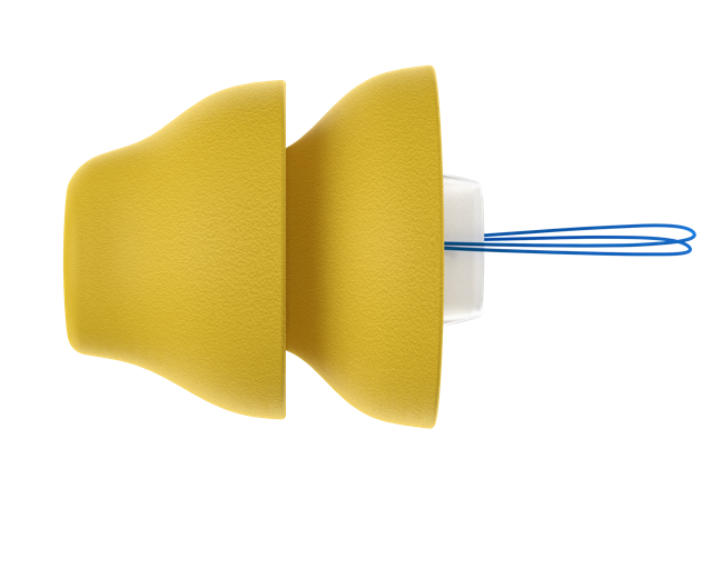 Close-up of a computer microphone with yellow foam windscreen and internal components visible