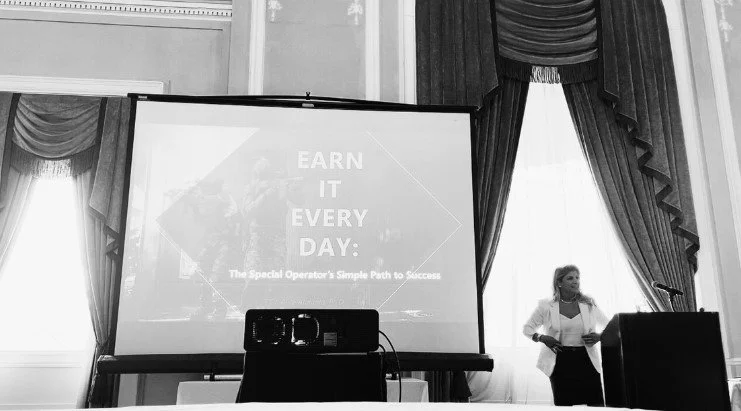 Women's empowerment expert Dr. Alice Atalanta presenting "Earn It Every Day: The Special Operator’s Simple Path to Success."