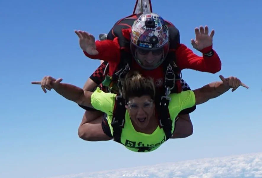 Women's empowerment Dr. Alice Atalanta skydiving and freeling wild, free, confident, joyful, and strong