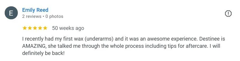 A review on an online platform by Emily Reed about her experience with waxing underarms, mentioning Destinee and tips for aftercare.