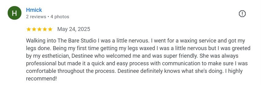 Screenshot of a Google review by Hmick dated May 24, 2025, praising Destinee at The Bare Studio for waxing service, describing the experience as professional, friendly, and comfortable.