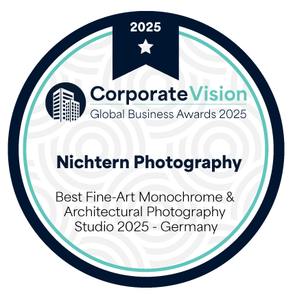 Award badge for Corporate Vision Global Business Awards 2025, presented to Nictern Photography for Best Fine-Art Monochrome & Architectural Photography Studio 2025 in Germany.