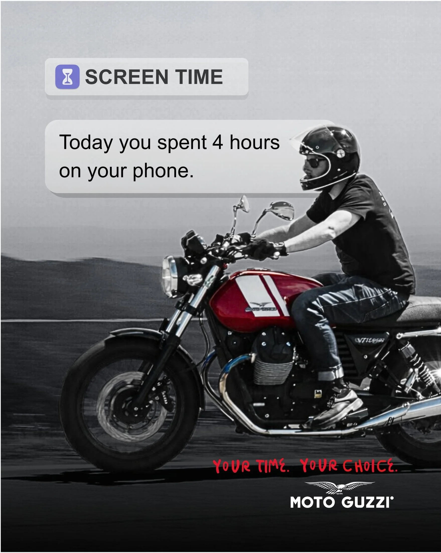 A person wearing a black helmet and t-shirt riding a red and black Moto Guzzi motorcycle on the road. Overlaid text says 'Screen Time' with a timer icon, and the message 'Today you spent 4 hours on your phone.' at the bottom.