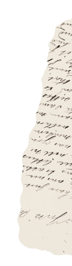 Torn piece of paper with handwritten cursive text