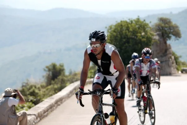 Stel competing on the bike leg of an Ironman triathlon