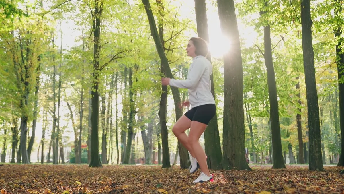 woman-running-woodland-mobile.jpg