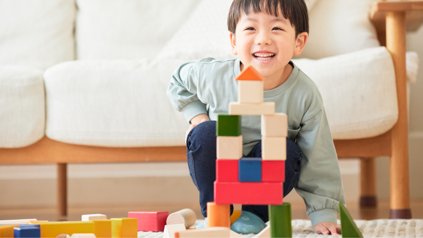 A NeuroCore ABA therapist and child working together on a shared activity in Dubai, representing the collaborative and family-centred approach of NeuroCore's ABA therapy programmes