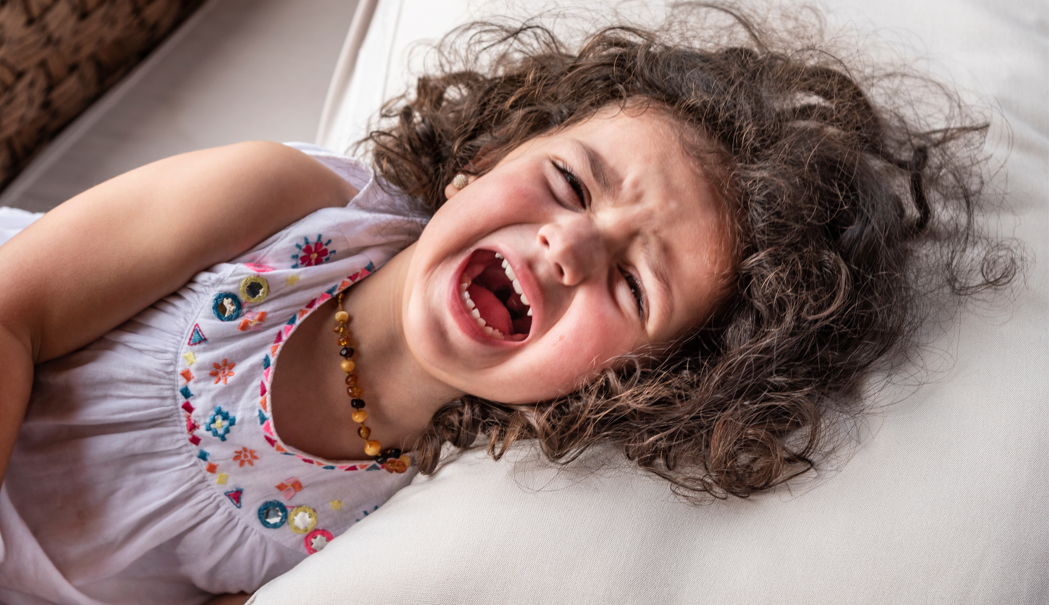 Child returning to regulation in a quiet space after a tantrum — supported by NeuroCore's ABA framework