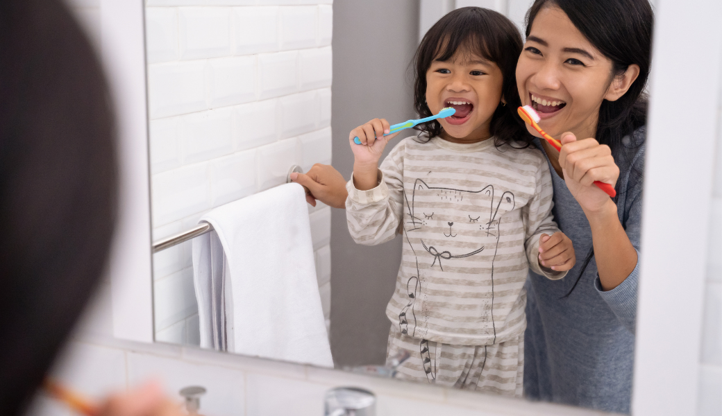 Child following a visual toothbrushing routine supported by NeuroCore's sensory-first approach