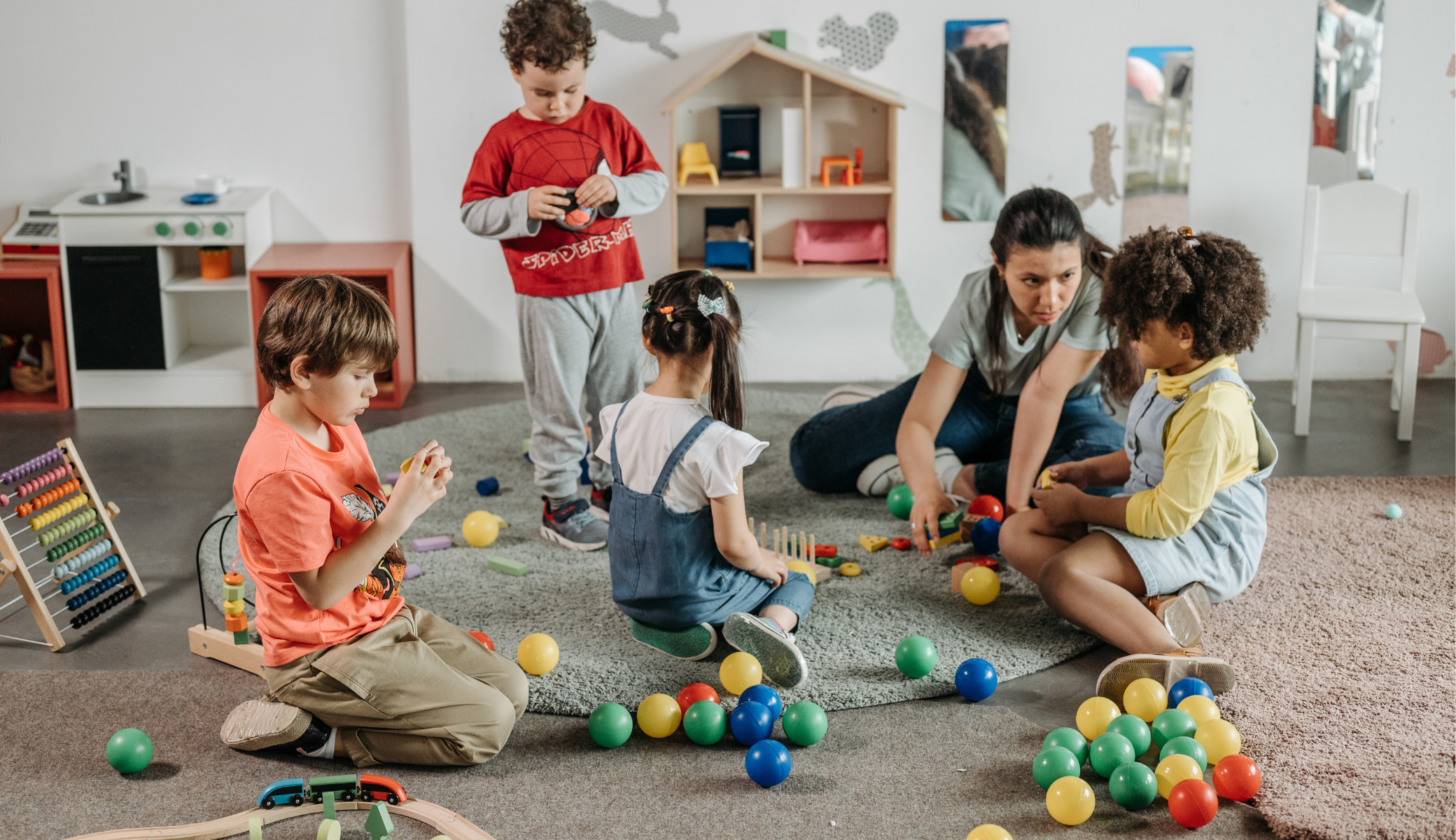 Toddler engaging in structured developmental play activity with therapist to build foundational communication and motor skills during early intervention