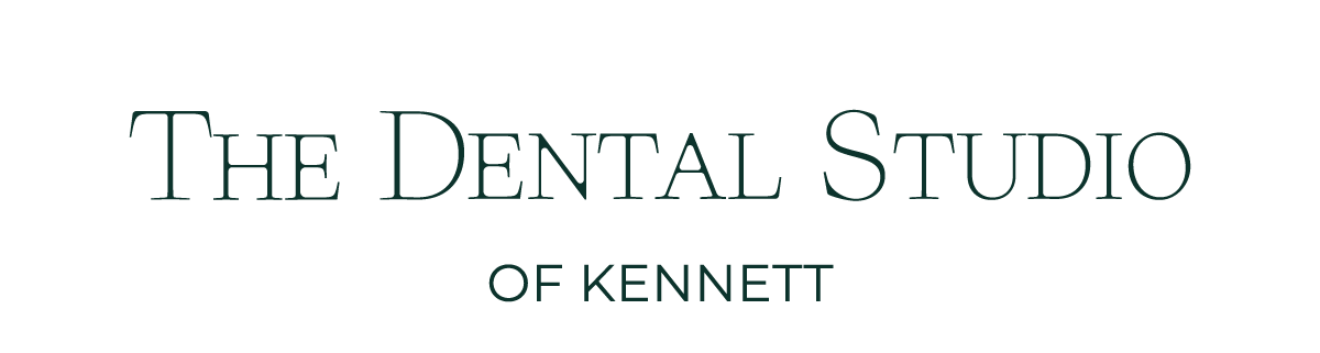The logo for The Dental Studio of Kennett, featuring stylized text with the studio's name.