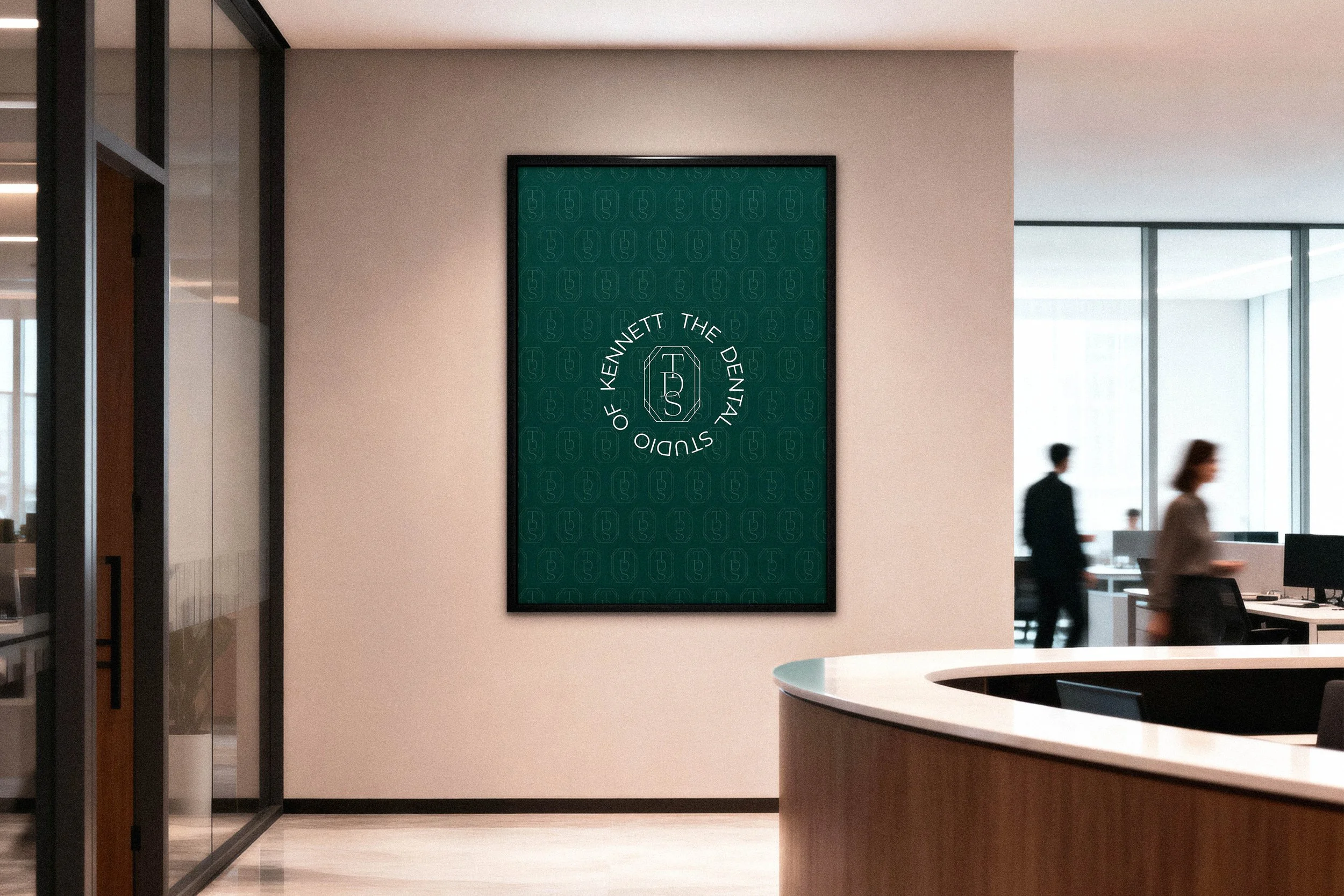 Framed poster on an office wall displaying the logo of the Kennedy The Donald.