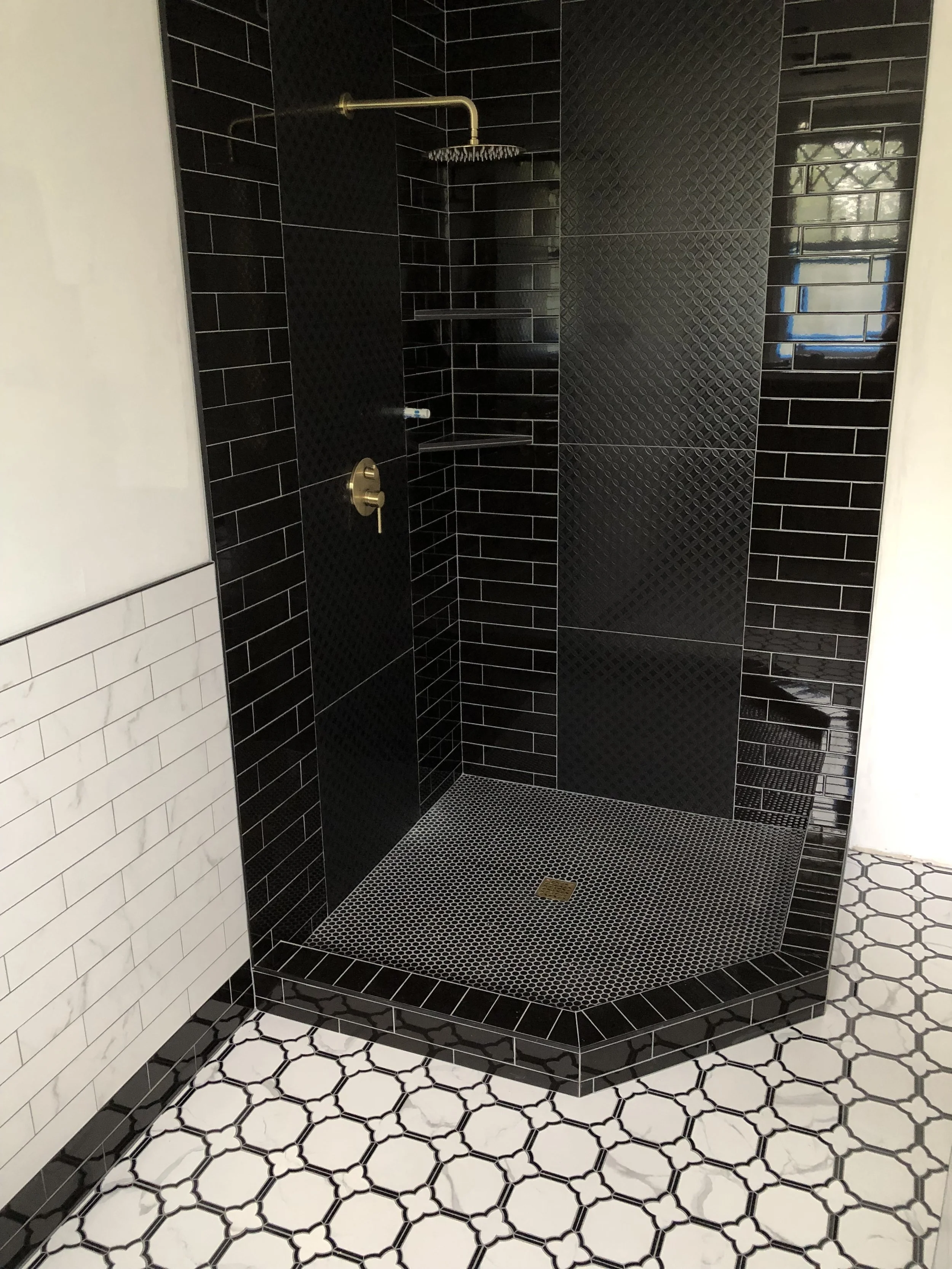 High-end bathroom makeover showcasing elegant design and flawless finish work by ANB Construction.